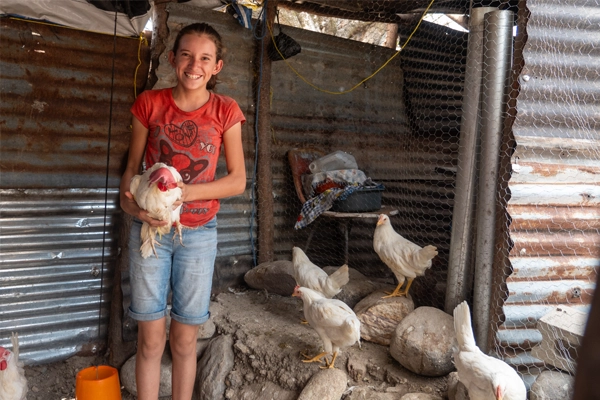 Family managing livestock production for nutrition and income