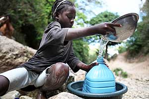 Choupette, 10, lives in rural Haiti and has to go to great lengths to collect water for her family. Every day she must trek down a rocky mountainside to fill two, one-gallon containers with water contaminated by animal waste, parasites and other harmful bacteria.