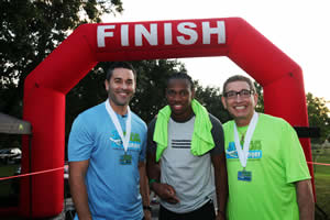 (L to R) Jason Martinez, co-anchor for WPLG-TV ABC Local 10 Morning News and Local 10 News at noon; Yohan Blake, Jamaican Olympic Gold medalist; and Angel Aloma, Food For The Poor's Executive Director.