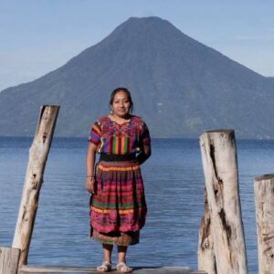 Woman from Guatemala poses in front of scenic view in her country part of fftp and mercado global partnership