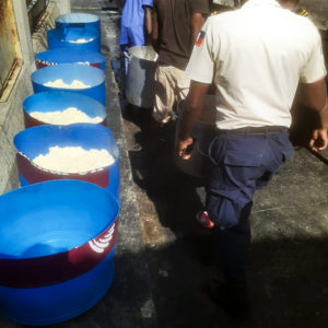 Food provided by Food For The Poor is delivered to prisoners at the main prison in Port-au-Prince, Haiti.