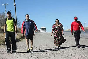 Daniel Valdez (far right) has spent recent months preparing for his third 500-mile walk from Lovington, N.M., to Chihuahua, Mexico, starting on Friday, Dec. 19, 2014. Walking approximately 33 miles a day, sometimes picking up supporters along the way, as seen here.