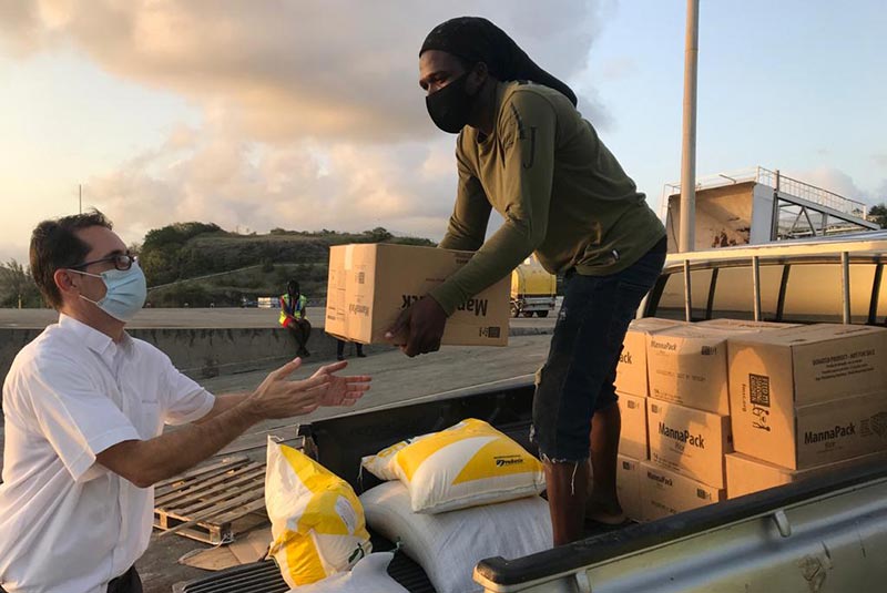 Relief items including MannaPack meals from Food For The Poor partner Feed My Starving Children arrive at the port on the island of St. Vincent, where they were shipped by charity partners Caritas Grenada and St. Lucia Redemptorists. Photo courtesy Fr. Kevin Murray, the Diocese of Kingstown