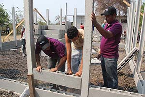 FedEx contractors volunteered their time over a weekend to help with the building and the painting of six homes in the El Doradito housing village outside the city of San Pedro Sula, Honduras. FedEx built 12 two-room homes, through Food For The Poor, in the Central American countries of Honduras and Nicaragua.