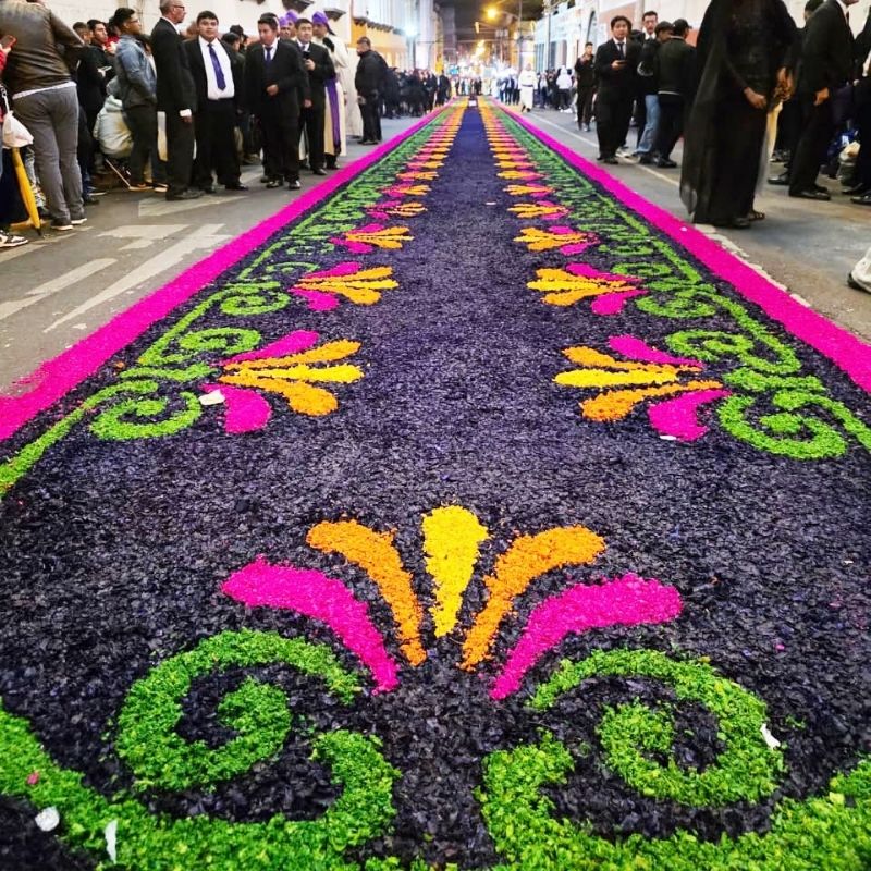 a colorful sawdust carpet in Guatemala