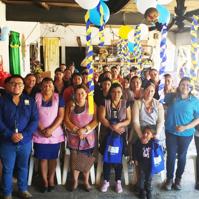 Jessica stands with a group of women in Guatemala
