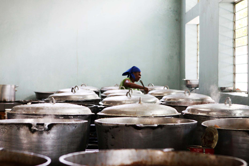 Photo of the Day: One woman, many vats