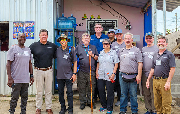 Frederico Garza standing with other FFTP members in Honduras