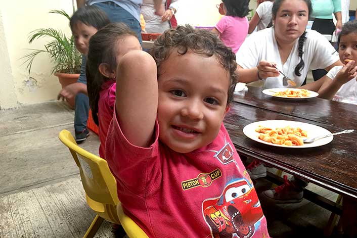 Guatemalan kid eating