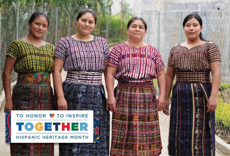 4 Hispanic women stand together in traditional clothing for hispanic heritage month 2025