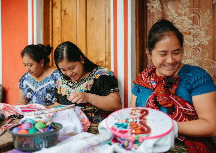 3 women in Guatemala sewing as part of FFTP's project to uplift women, part of international women's day