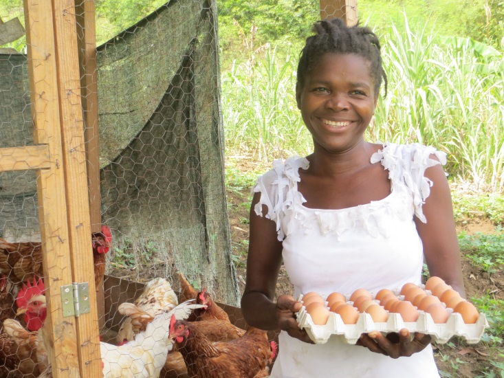 Another beneficiary of the chicken project in Kadwa, Haiti. 