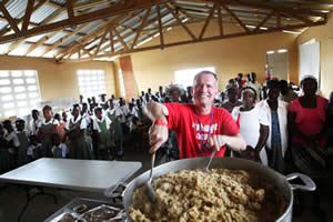 Larry Moore prepares a rice-based meal.
