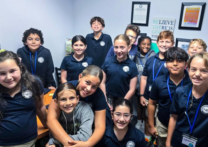 North Broward Prep students pose for a group picture at school after raising funds for FFTP