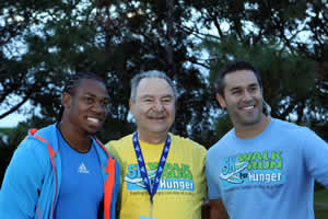 Olympic medalist Yohan Blake, from left, Food For The Poor's President/CEO Robin Mahfood, and ABC Channel 10 anchor Jason Martinez.