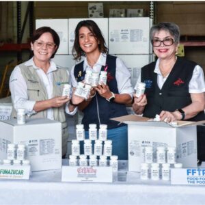 FFTP, CEPUDO and FUNAZUCAR showing prenatal vitamins that will be distributed in Honduras