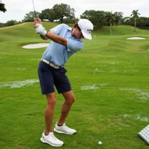 Rafe Cochran takes a practice swing at last year's Rafe Cochran golf classic