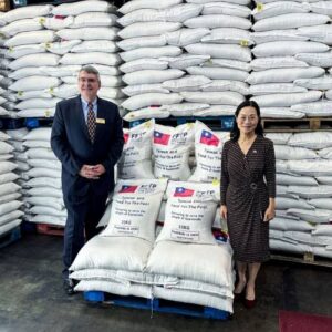 FFTP President stands with Taiwan's Ambassador to Guatemala as Taiwan donates rice to FFTP's Guatemala partners