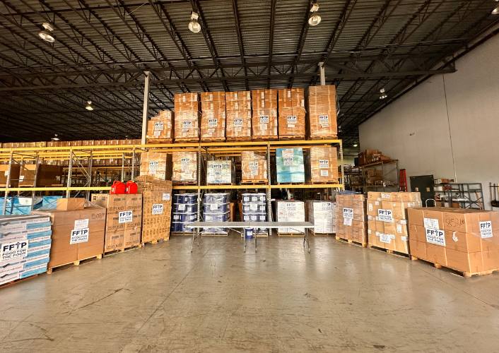 The FFTP warehouse filled with boxes ready to distribute aid to those affected by tropical storm Melissa