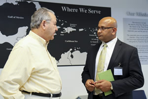 TRobin Mahfood, President/CEO of Food For The Poor and Vic Ramdass, the director of U.S. Southern Commands Partnering Directorate inked a humanitarian partnership.