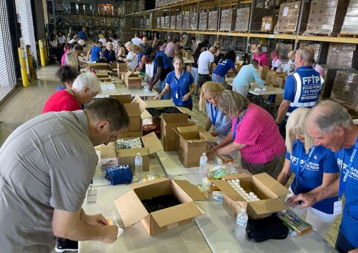 Food For The Poor Honors Veterans on Veterans Day: Veterans, Volunteers Team Up to Pack Hygiene Kits for Veterans in Need